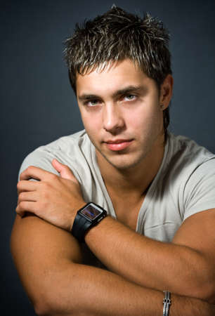 Studio closeup portrait of sexy young manの写真素材