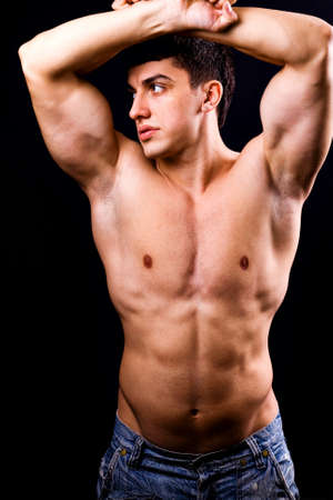 Portrait of sexy muscular man with fit bodyの写真素材