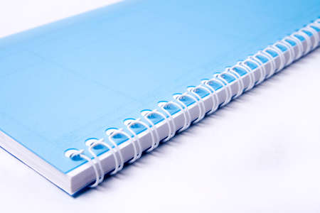Macro view of notebook rings over whiteの写真素材