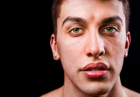 Face of handsome sensual man isolated on black backgroundの写真素材