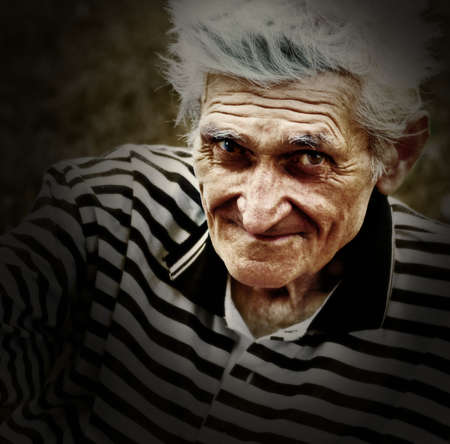 Artistic vintage portrait of senior manの写真素材