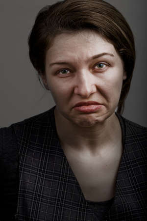 Unhappy sad disappointed womanの写真素材