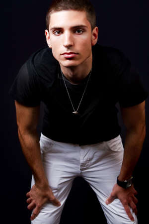 Fashion portrait of handsome sexy young man
