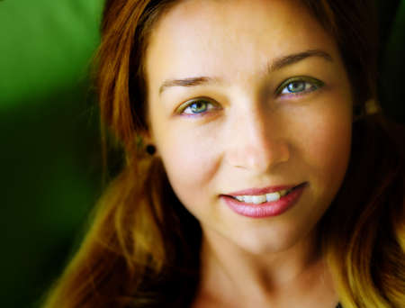 Face of sensual cute friendly woman