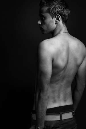 Back of masculine sexy shirtless thin manの写真素材