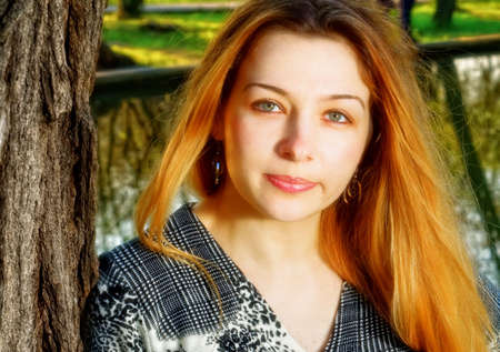 Portrait of one fresh clean young woman outdoorの写真素材