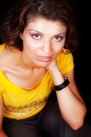 One middle aged woman with big brown eyesの写真素材