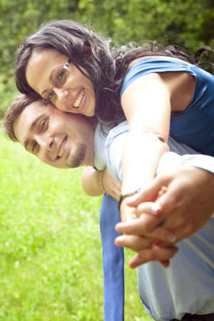 Joyful happy young couple having funの写真素材