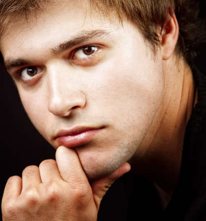 Close up portrait of one handsome masculine maleの写真素材