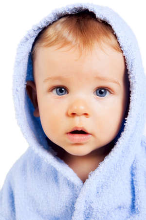 Cute baby child with blue eyes isolated on whiteの写真素材