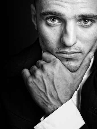 Portrait of one handsome elegant masculine young manの写真素材
