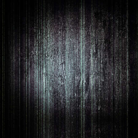 Abstract textured dark background with scratches and cracksの写真素材