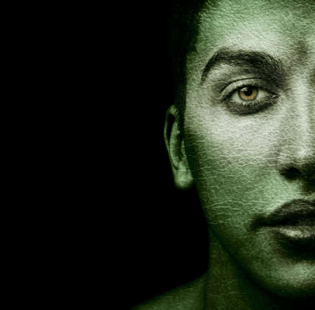 Half face of strange man with textured skinの写真素材