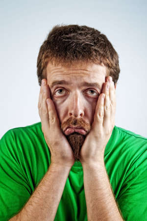 Portrait of sad unhappy bored depressed manの写真素材