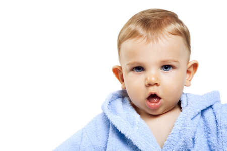 Cute baby boy with funny expression over whiteの写真素材