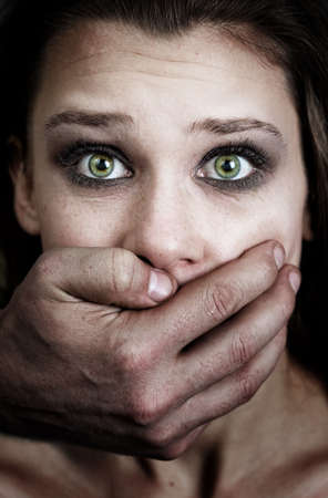 Fear of woman victim of domestic violence and abuseの写真素材