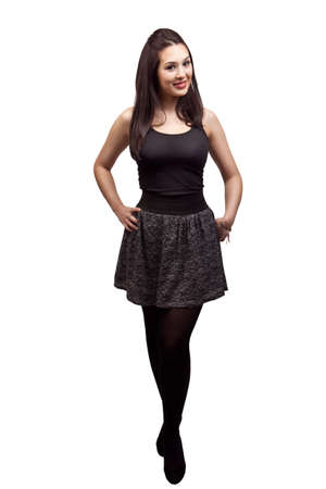 Full body of sexy slim brunette isolated on whiteの写真素材