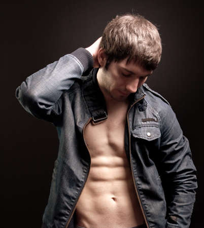 Sexy fit young man with muscular absの写真素材