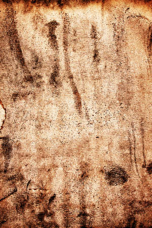 Dirty old textured brown paper or parchmentの写真素材