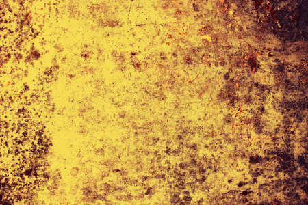 Backdrop of old yellow grunge dirty wallの写真素材