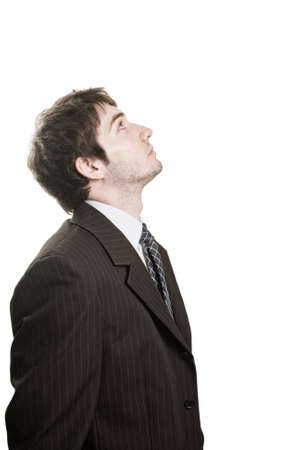 One awaiting isolated business man looking aboveの写真素材