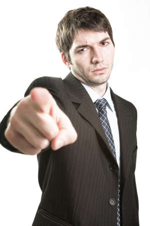 Angry boss or furious business man pointing forwardの写真素材
