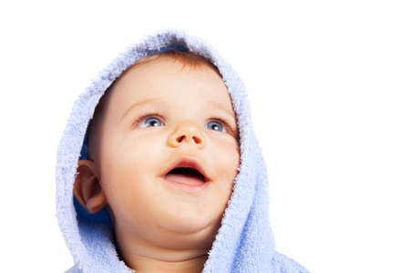 One isolated baby boy looking above himの写真素材