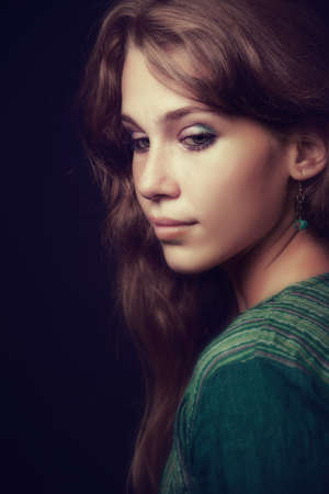 Artistic portrait of sensual beautiful young womanの写真素材