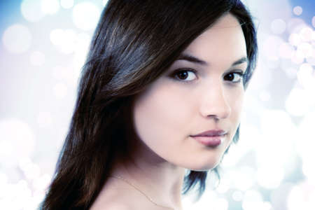 Beauty portrait of feminine pure young womanの写真素材
