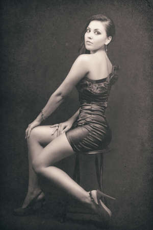 Retro portrait of sexy elegant young womanの写真素材