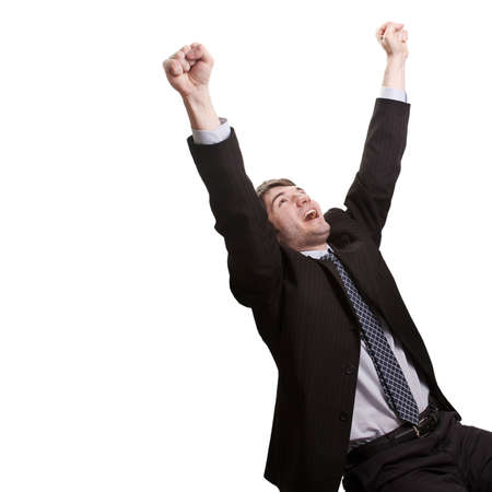 Win and success concept - victorious young businessmanの写真素材