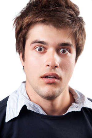 Funny young man beeing amazed and surprisedの写真素材