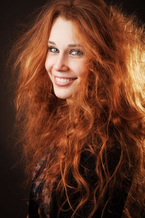 Young woman with beautiful long fluffy hair の写真素材