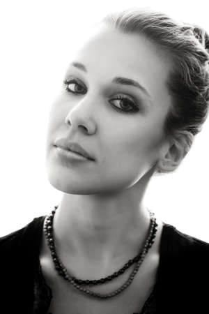 Fashion portrait of sensual young woman over whiteの写真素材