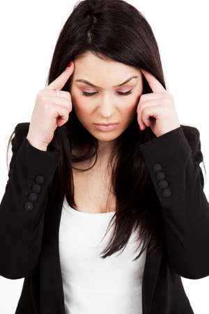 Headache or migraine concept - tired stressed womanの写真素材