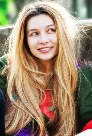 One young cute woman with long blond hairの写真素材