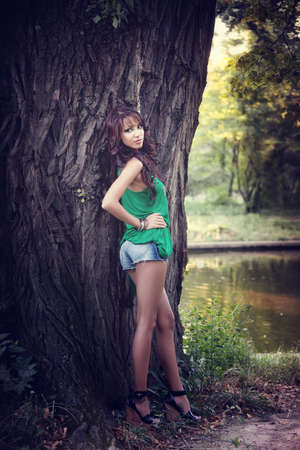 Beautiful young woman with sexy long legsの写真素材