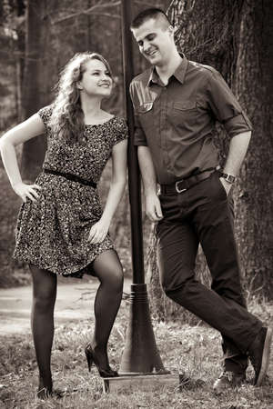 Happy cute couple having fun outdoorsの写真素材