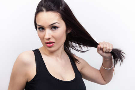 Woman with healthy long hair over whiteの写真素材