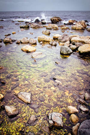 Seascape - sea waves and rocksの写真素材