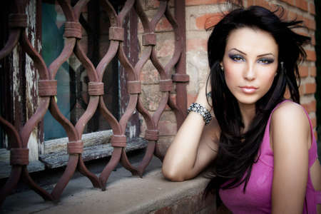 One elegant sexy beautiful young woman posing outdoorの写真素材