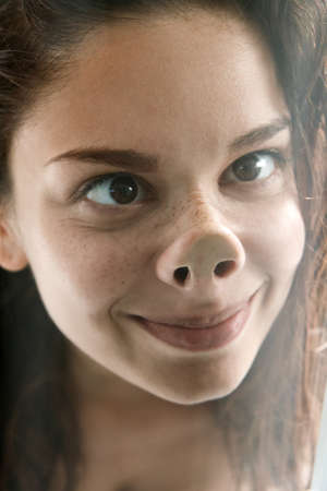 Funny face of playful young womanの写真素材