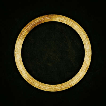 Ancient golden ring on abstract texture backgroundの写真素材