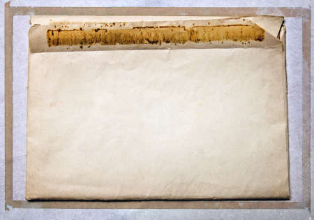 Old vintage mail envelope with retro borderの写真素材