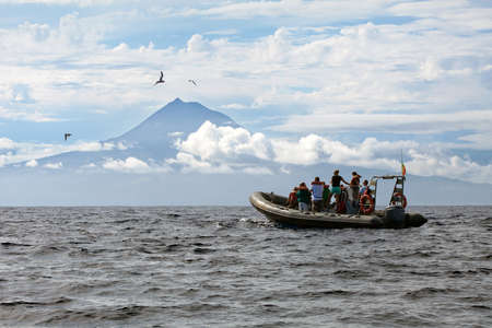 Sail boat near Pico volcano island in Azores, Portugalの写真素材
