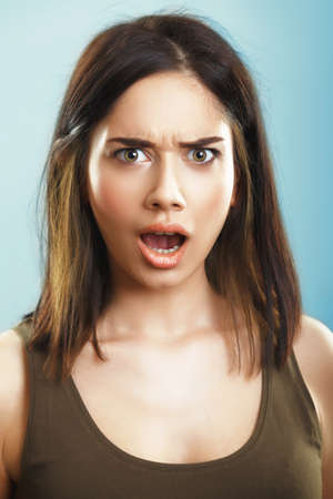Shocked Surprised and Offended Young Womanの写真素材