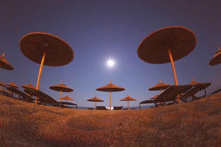 Beach Umbrellas at Moon Light Wallpaperの写真素材