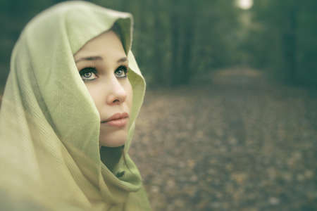 Artistic portrait of beautiful sensual young womanの写真素材