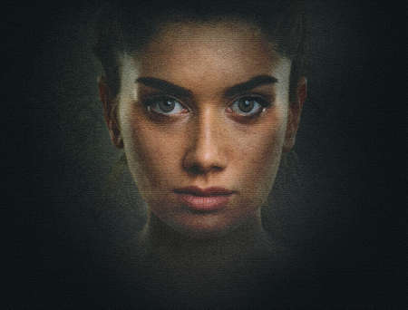 Artistic dark portrait of sensual woman with beautiful face and eyesの写真素材
