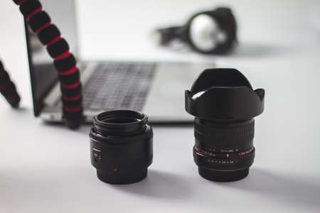 organization of photographic material and editing with computer on work tableの写真素材